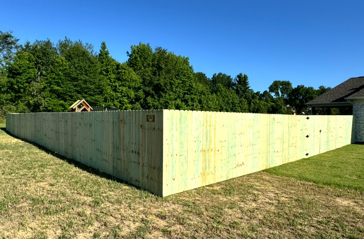 Pine privacy fence along a residential backyard